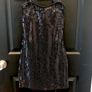 Short black sleeveless cocktail dress